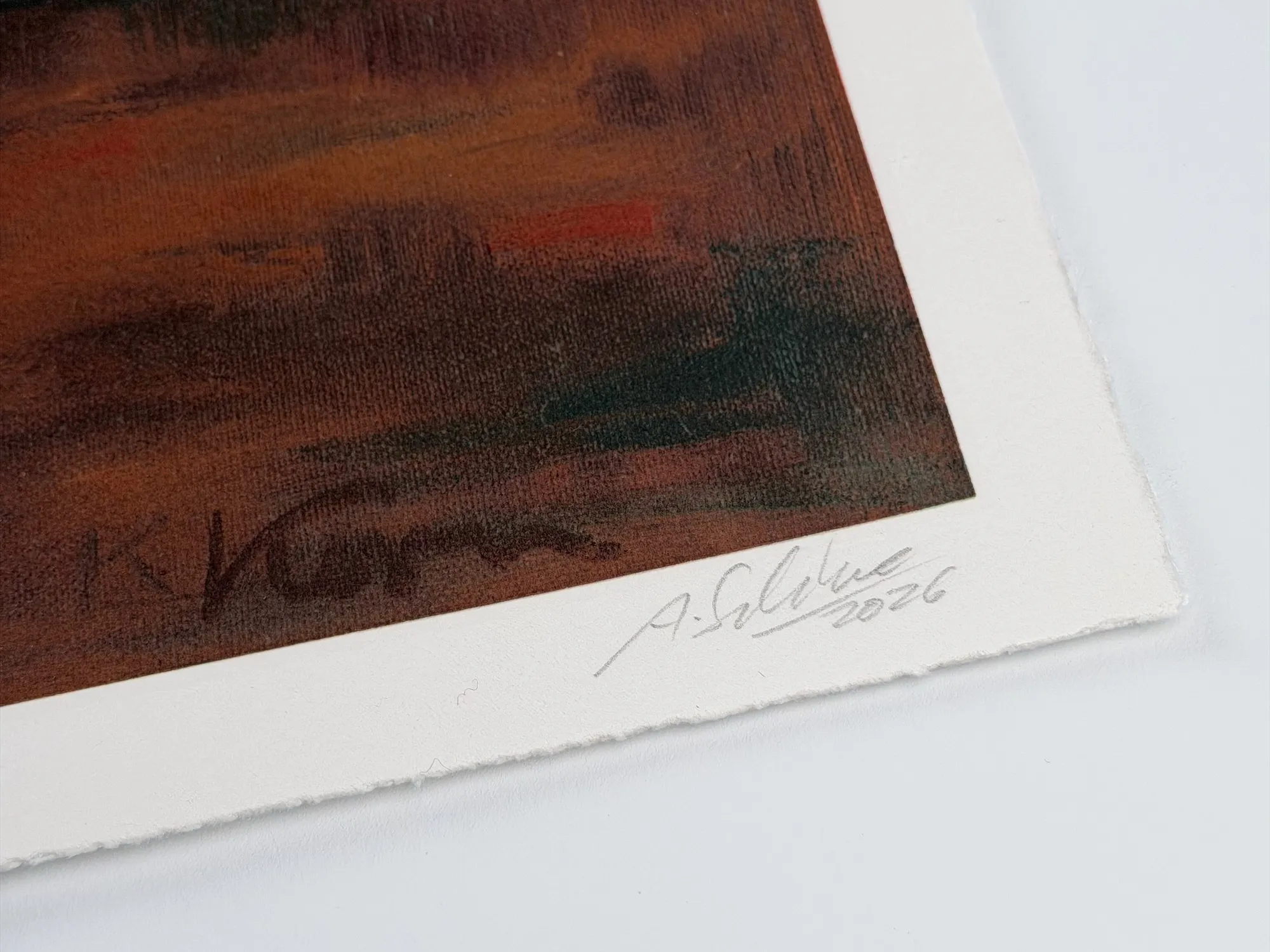 Close-up of the print's lower right corner: the signature K. Kern painted in dark brown inside the image, with A. Schulze 2026 written in pencil in the white margin below, and the canvas weave visible through the print.