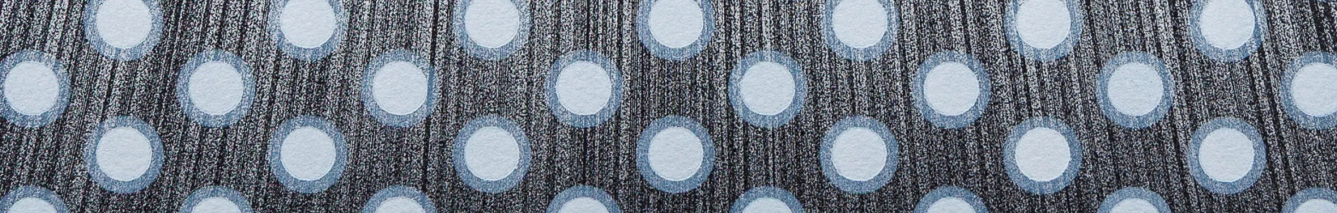 Detail of Kai and Sunny's Falling Frequency, a letterpress print: rows of pale blue rings over dense vertical black lines.