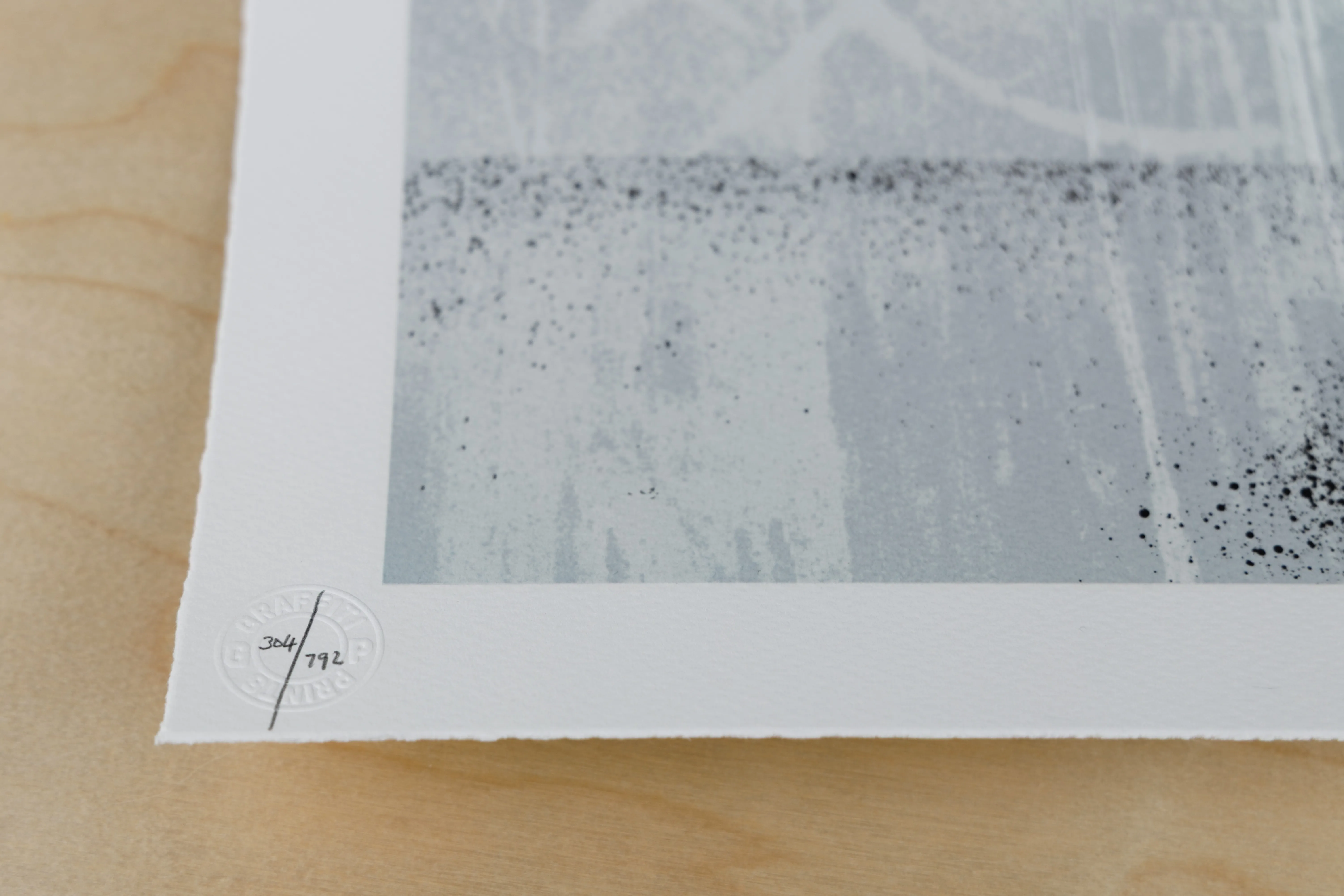 A close-up of a pencil edition number in the lower margin of a screen print.