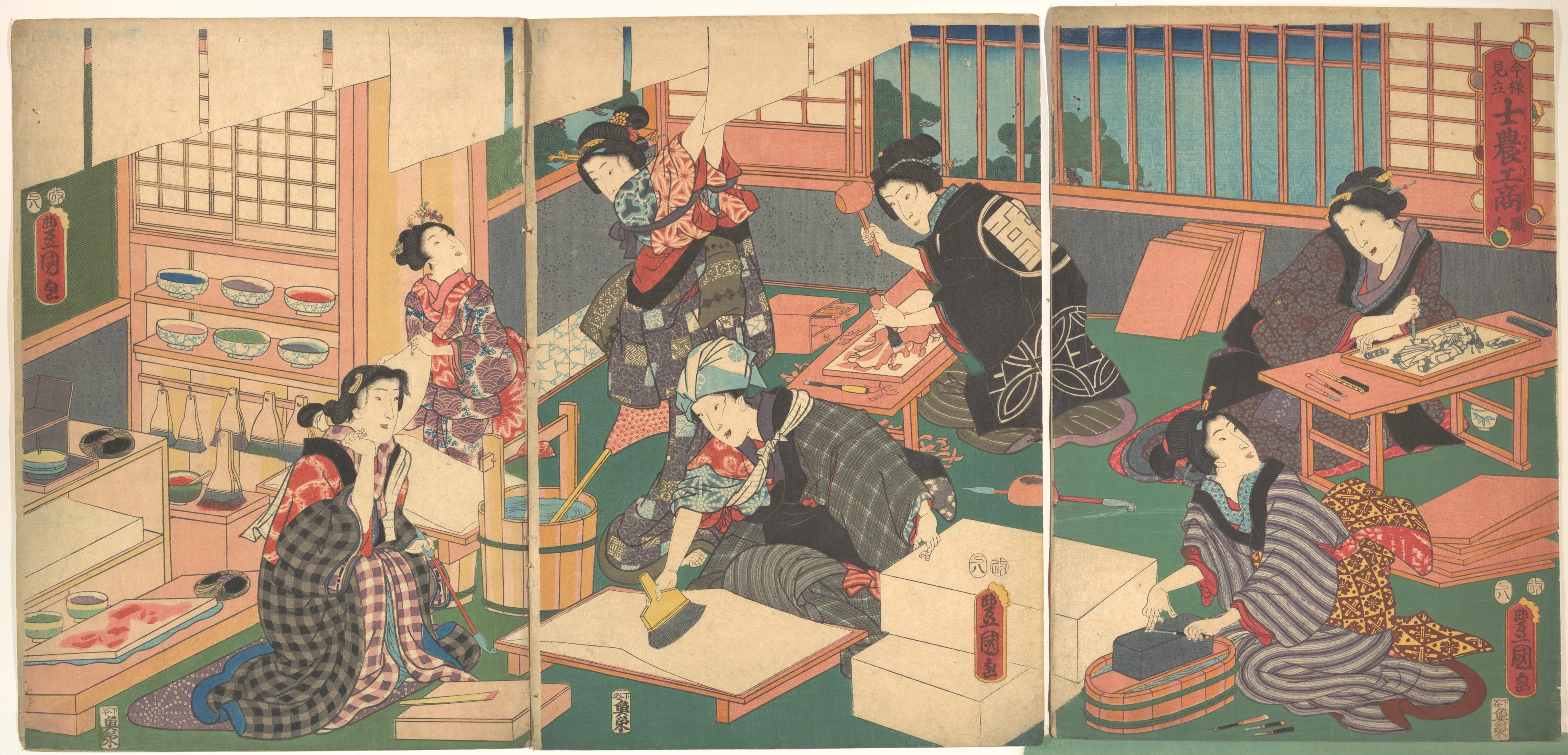 A Utagawa Kunisada triptych of a woodblock-print workshop: women carving blocks, sizing paper, and printing.