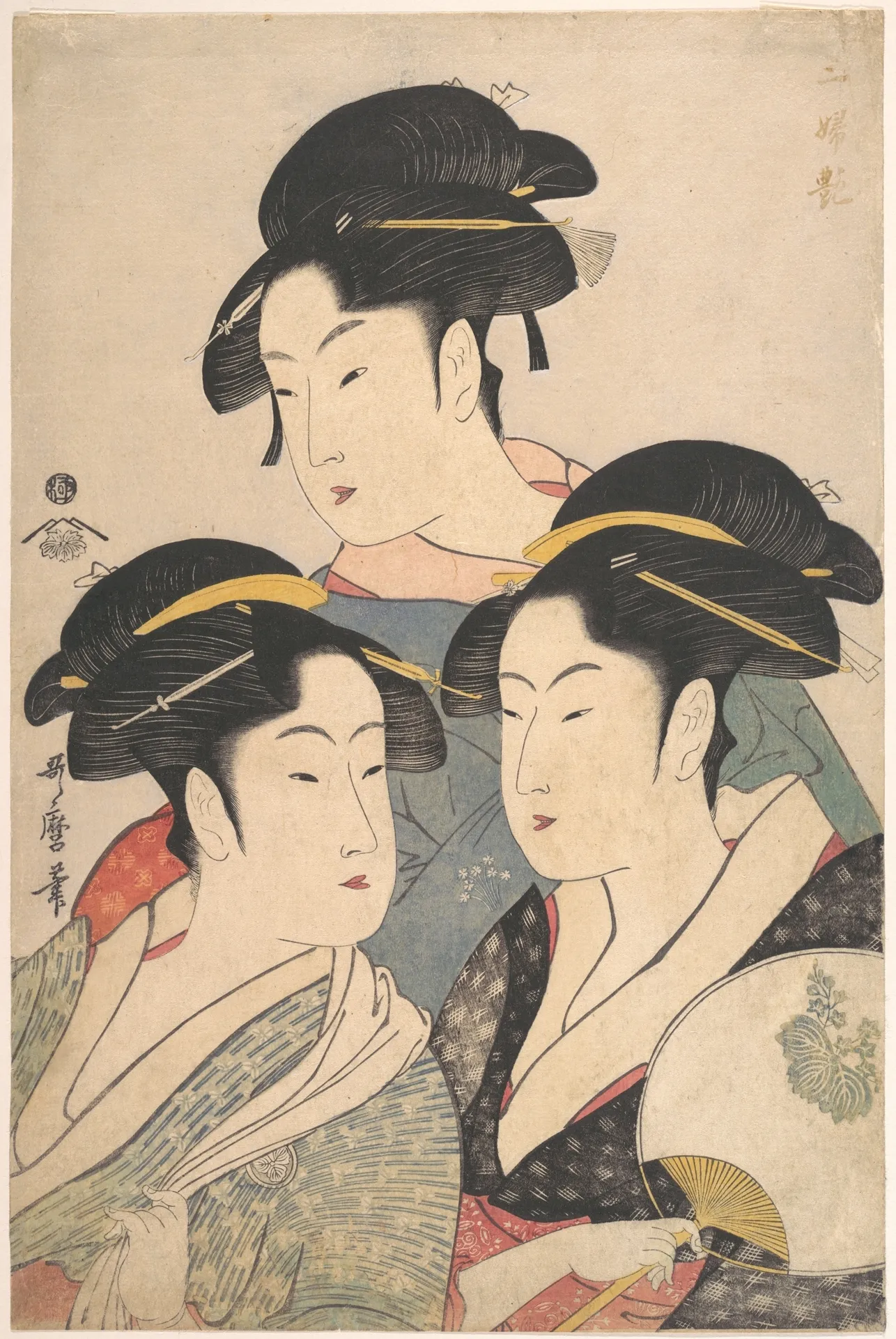Utamaro's Three Beauties of the Kwansei Period: the heads and shoulders of three celebrated Edo beauties arranged in a triangle.